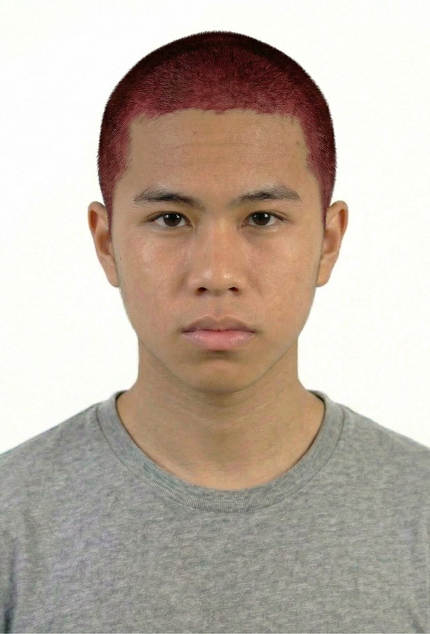 Ethan Flores with a fresh buzz cut at enlistment